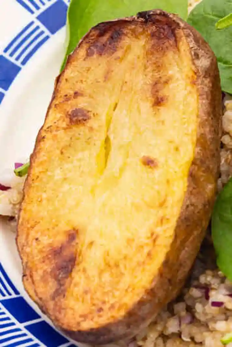 Tyndsteg med bagte kartofler og kryddersmør